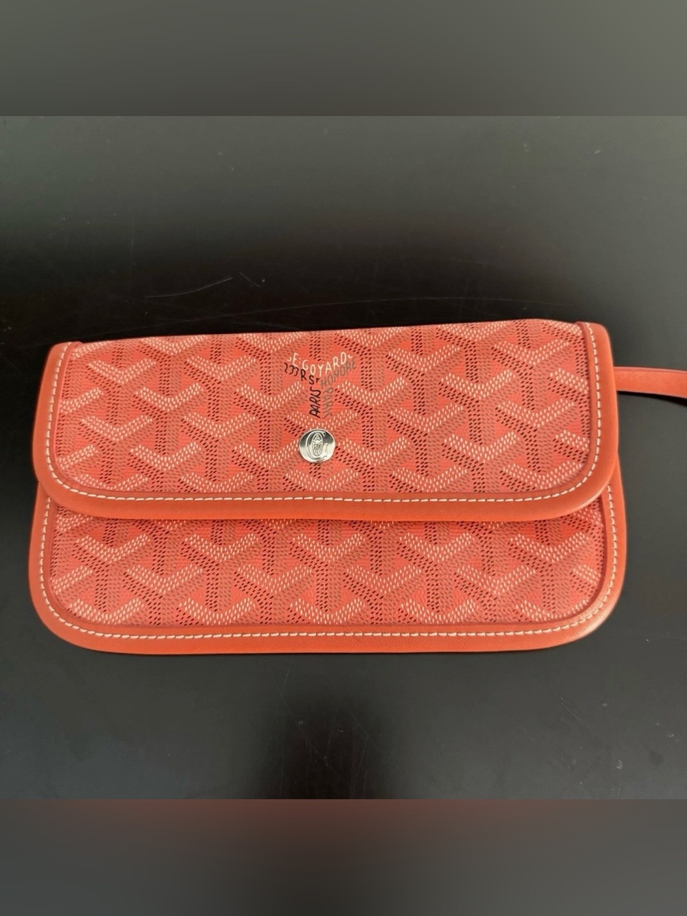 GOYARD Pochette Orange  Pouch Wallet. The pouch itself is in very good condition